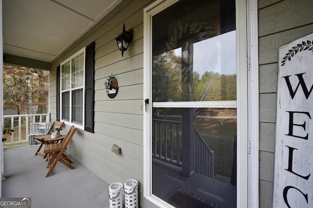 entrance to property with covered porch