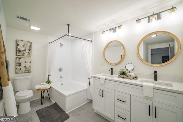 full bathroom featuring shower / tub combo, vanity, and toilet