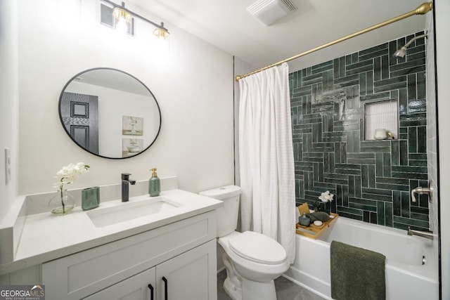 full bathroom featuring shower / bath combination with curtain, vanity, and toilet