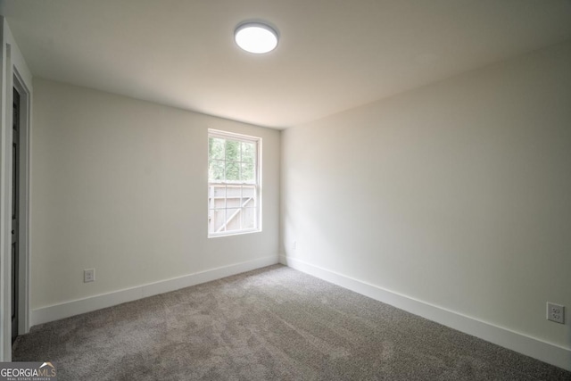 spare room featuring carpet flooring