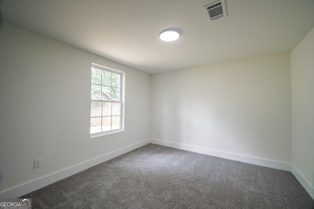 unfurnished room with carpet floors