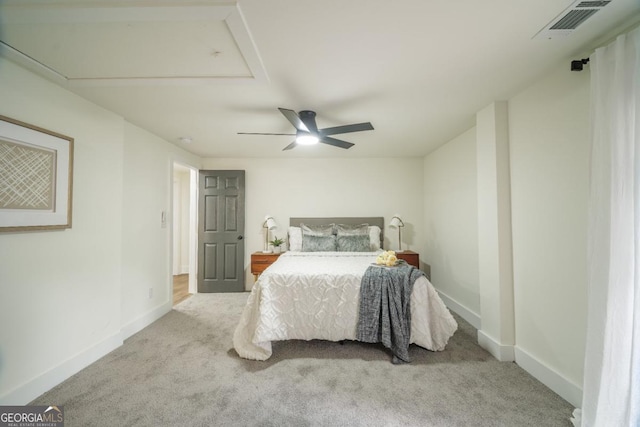 carpeted bedroom with ceiling fan