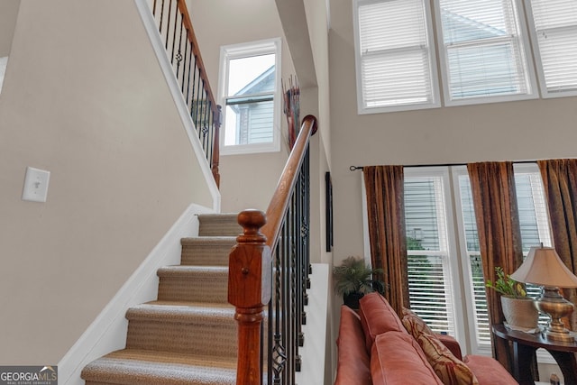 stairway with a high ceiling