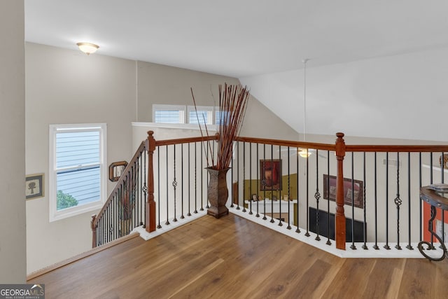 corridor featuring hardwood / wood-style floors