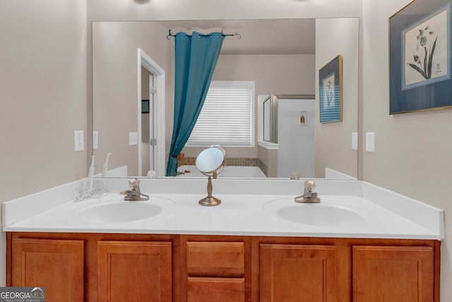 bathroom featuring vanity and an enclosed shower