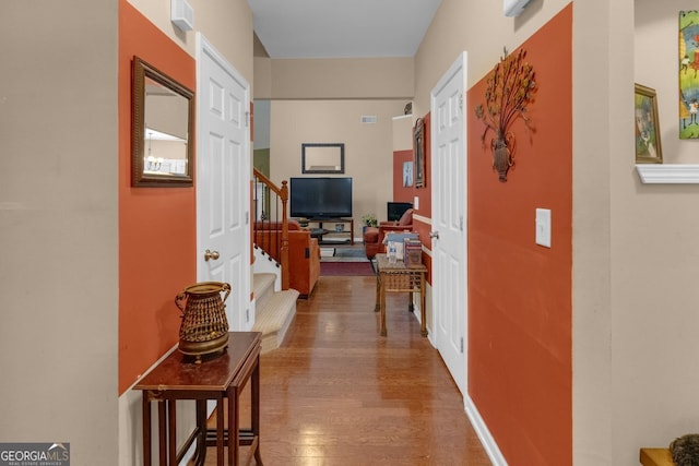 hallway featuring hardwood / wood-style floors