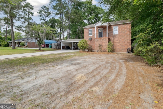 view of front of house featuring a carport