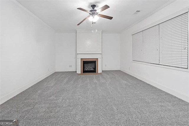 unfurnished living room with ceiling fan, light colored carpet, and ornamental molding