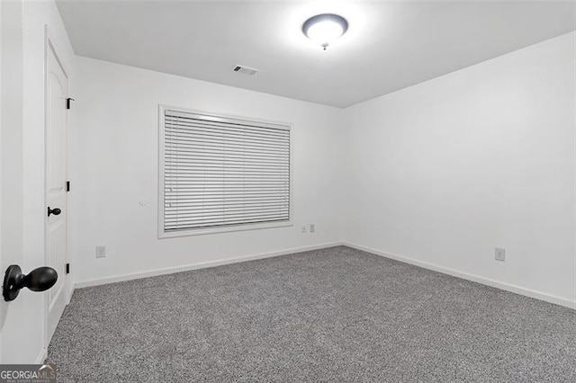 empty room with carpet floors