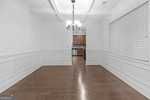 unfurnished dining area with beam ceiling, dark wood-type flooring, coffered ceiling, and an inviting chandelier