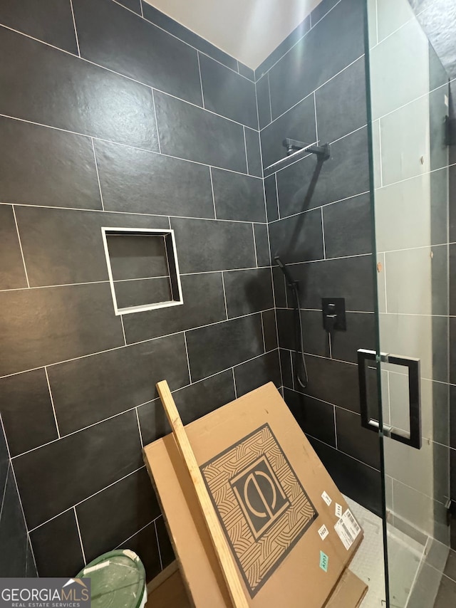 bathroom with a stall shower