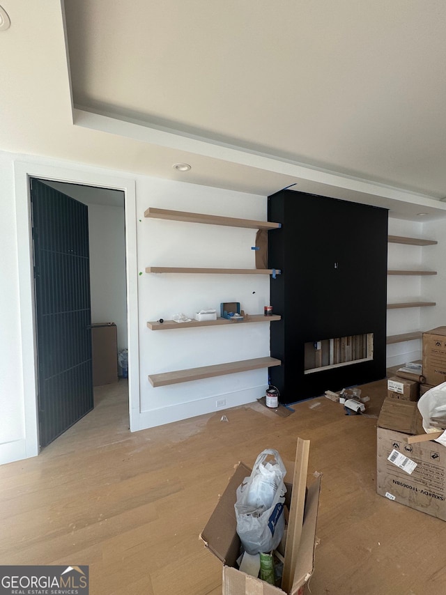 living room with wood finished floors