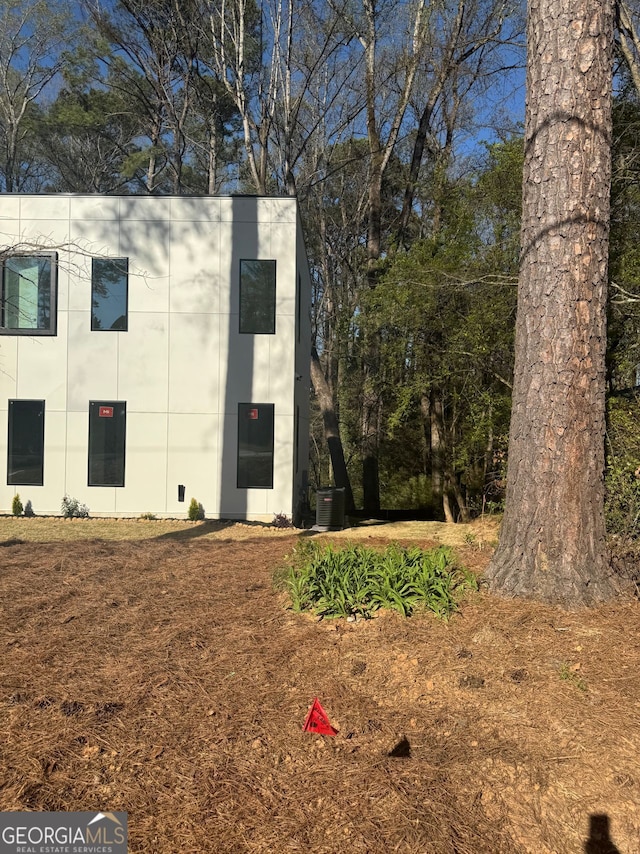 view of front of house featuring central AC
