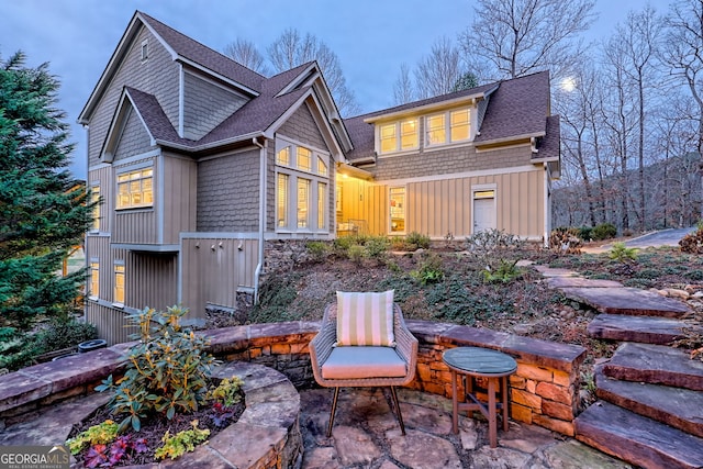 back of house with a patio area