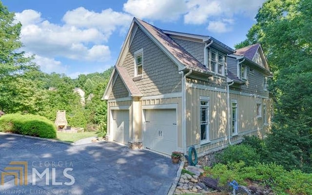 view of home's exterior with a garage