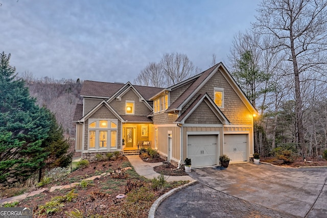 view of front of home with a garage