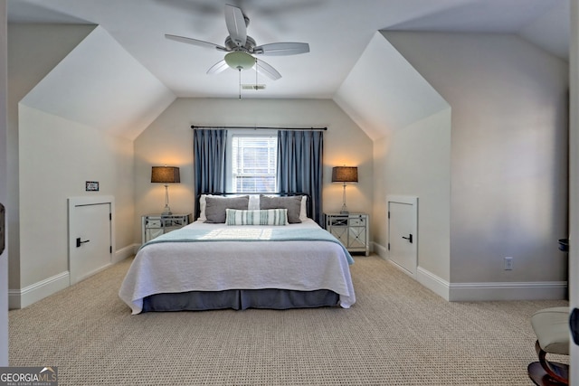 carpeted bedroom with lofted ceiling and ceiling fan