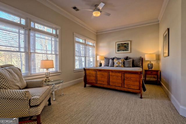 bedroom featuring ceiling fan, light colored carpet, and crown molding