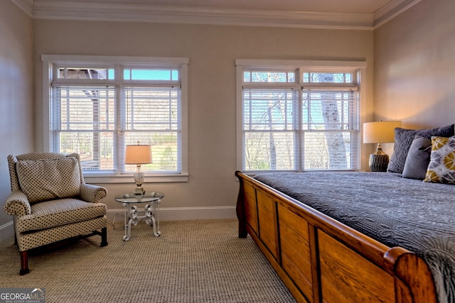 carpeted bedroom with ornamental molding