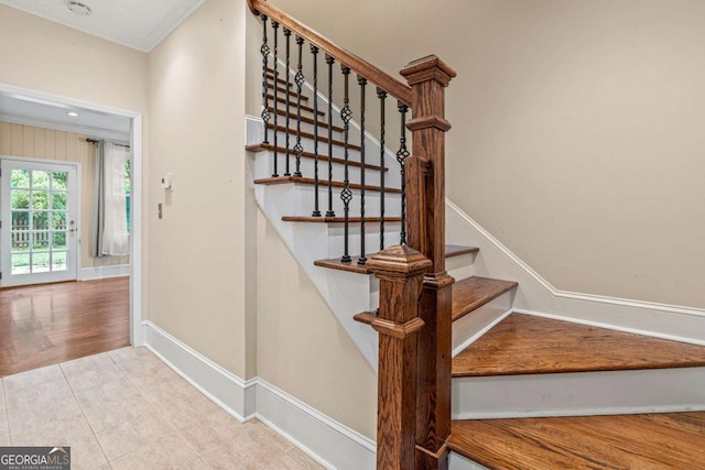 stairway featuring tile patterned floors