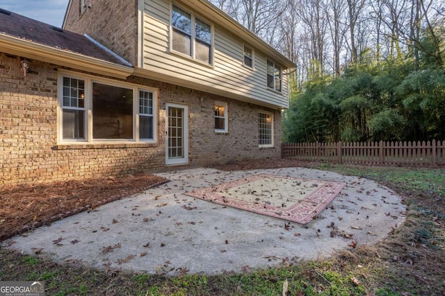 rear view of property with a patio