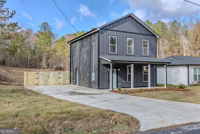 view of front property with a front lawn and a porch