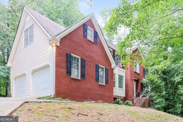 view of home's exterior with a garage