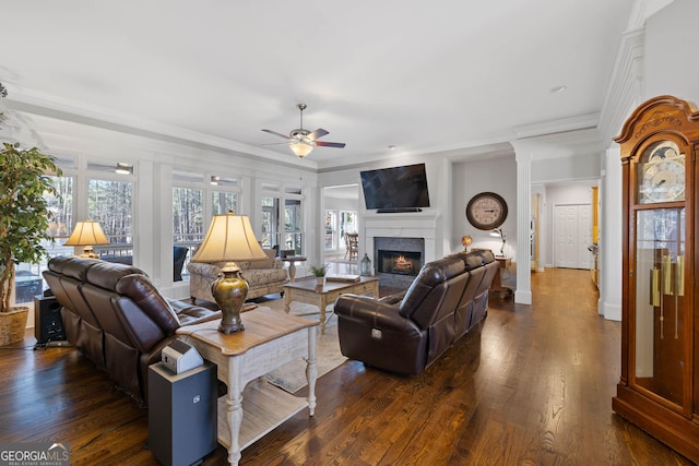 stairway with plenty of natural light and crown molding