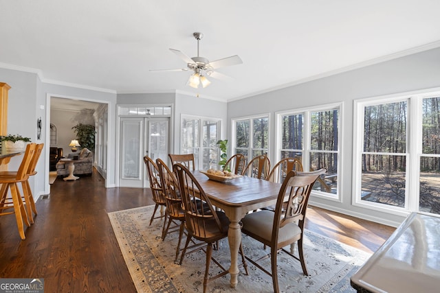 kitchen with tasteful backsplash, glass insert cabinets, a kitchen breakfast bar, stainless steel oven, and pendant lighting