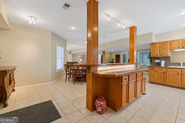 dining space featuring a wealth of natural light, recessed lighting, and light tile patterned floors