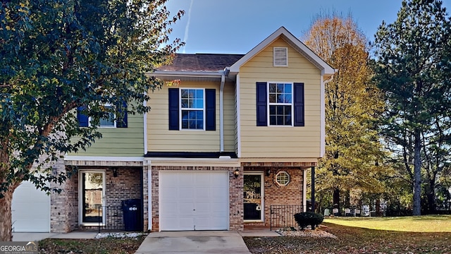 view of front of property with a garage