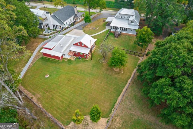 view of front of house featuring ceiling fan and covered porch