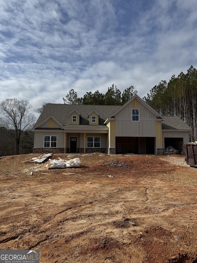 craftsman-style home with a garage