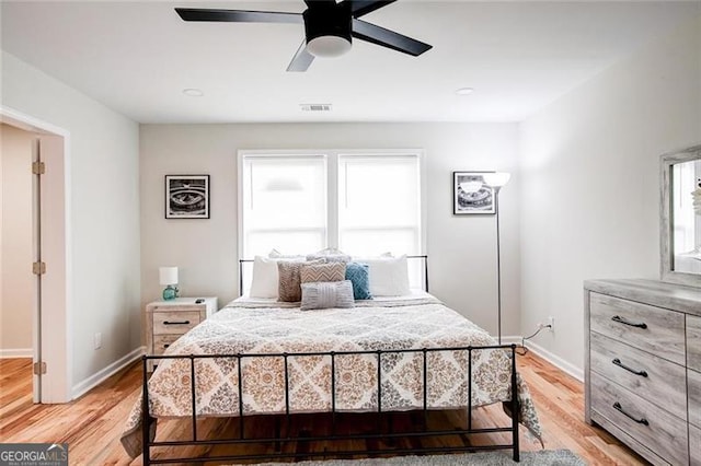 bedroom featuring wood-type flooring and ceiling fan