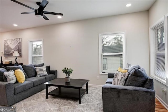 living room featuring ceiling fan