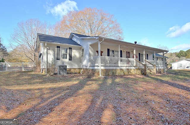 view of front of property featuring central AC unit and covered porch