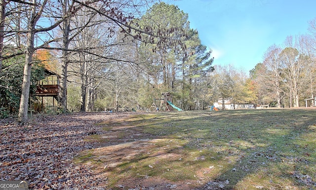 view of yard with a playground