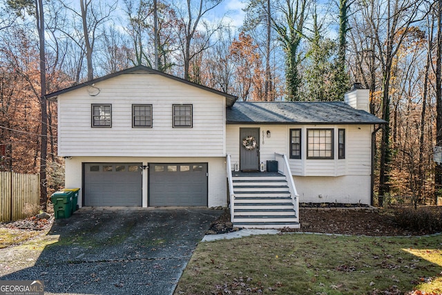 view of front of property featuring a garage