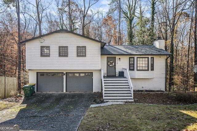 view of front of property with a garage