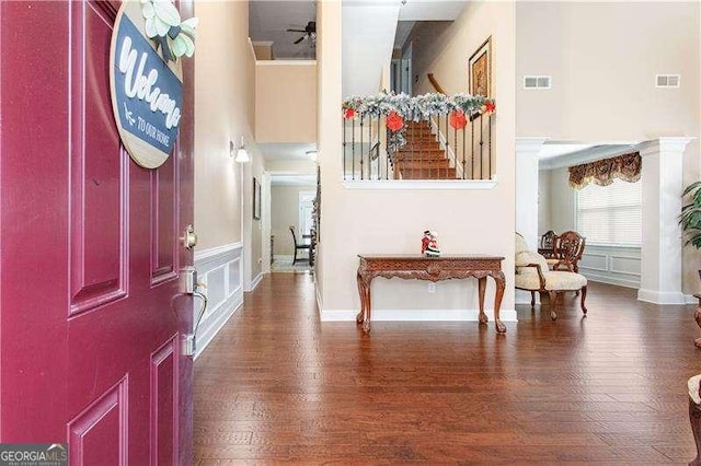 entryway with ceiling fan and dark hardwood / wood-style floors