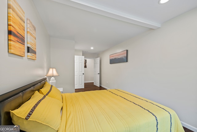 bedroom featuring dark hardwood / wood-style flooring