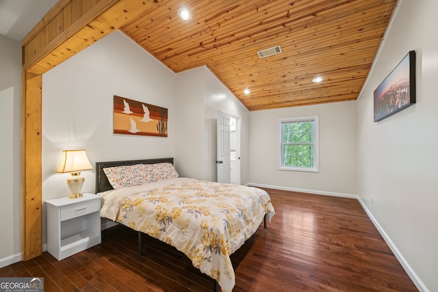 bedroom featuring dark hardwood / wood-style flooring, lofted ceiling, and wood ceiling