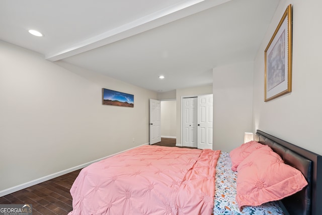 bedroom featuring dark hardwood / wood-style flooring