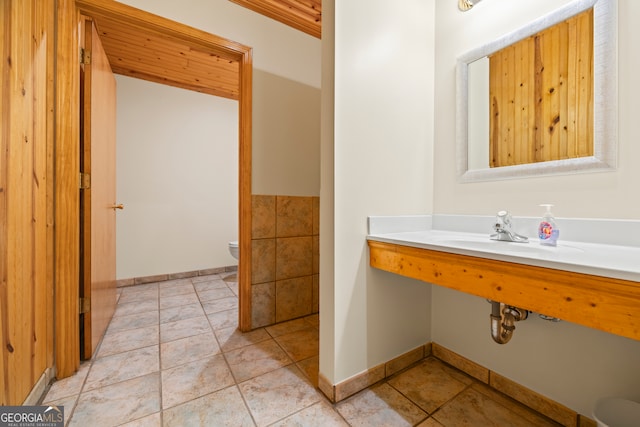 bathroom featuring tile patterned floors, sink, and toilet