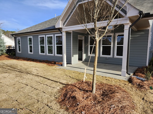 back of house featuring a patio