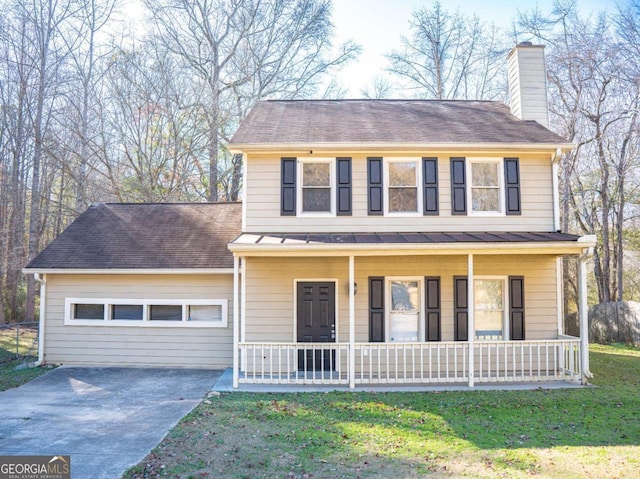 view of front of home featuring a front yard and a porch