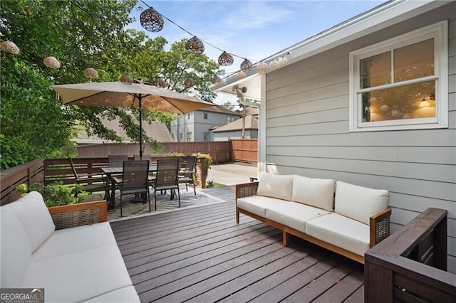 deck with an outdoor hangout area