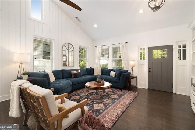 living room featuring high vaulted ceiling, ceiling fan, and dark wood-type flooring