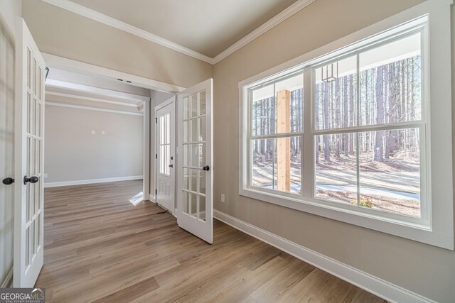 kitchen with dishwasher, white cabinets, crown molding, light stone countertops, and dark hardwood / wood-style flooring