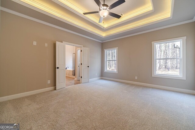 entryway with dark hardwood / wood-style flooring, ornamental molding, and a notable chandelier